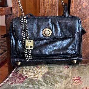 HOBO Black Crossbody Bag with Chain Strap and Gold Hardware